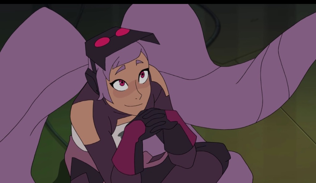 Entrapta, her hands folded under her chin, smiles at a character off-screen.